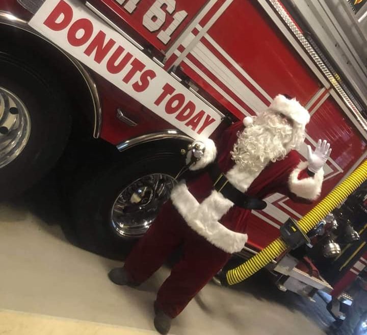 Santa in front of Kimberton Fire Company truck "Tower 61".